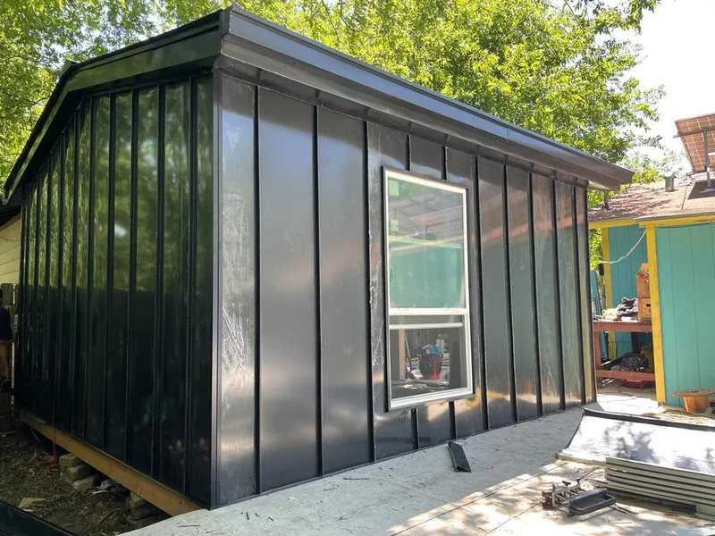Black standing seam metal wall panels for Roof Inspection in Waimanalo