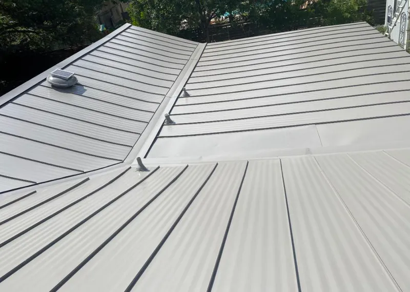 Solar attic fan installed on a metal roof for Roof Ventilation in Waimanalo
